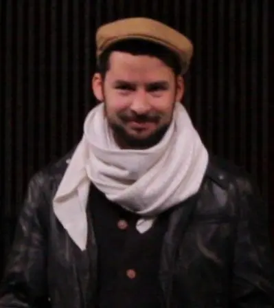 Isam B