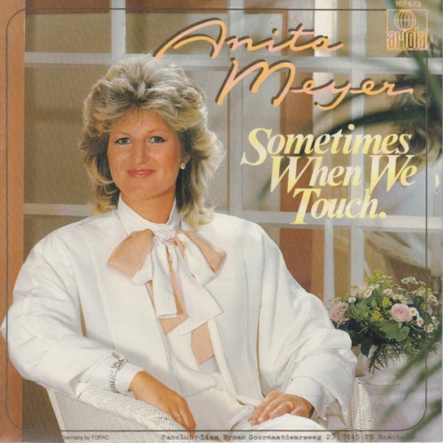 Sometimes When We Touch / Only a Woman