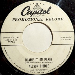 Blame It on Paree / In a Small Forgotten Town