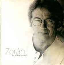 Az ablak mellett