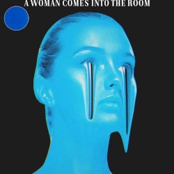A WOMAN COMES INTO THE ROOM