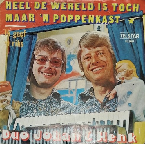Heel de wereld is toch maar een poppenkast / Ik geef een riks voor je gedachten