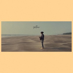 yellow (on a beach)