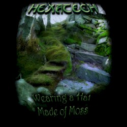 Wearing A Hat Made Of Moss