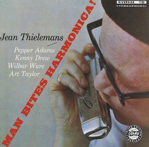 Man Bites Harmonica!