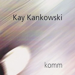komm