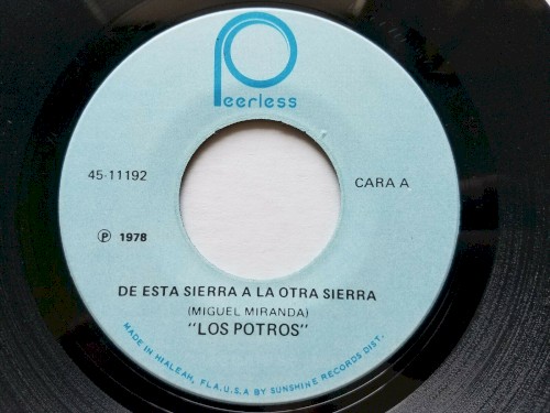 De esta sierra a la otra sierra / La vi partir
