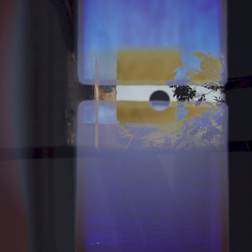 Islands Tethered by Red Twine