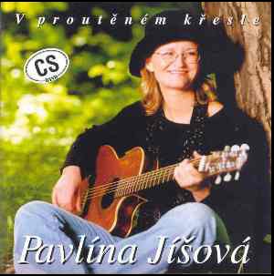 V proutěném křesle