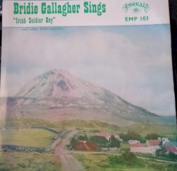 Sings "Irish Soldier Boy"
